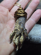 Load image into Gallery viewer, Raccoon paw 30 inch gold tone necklace
