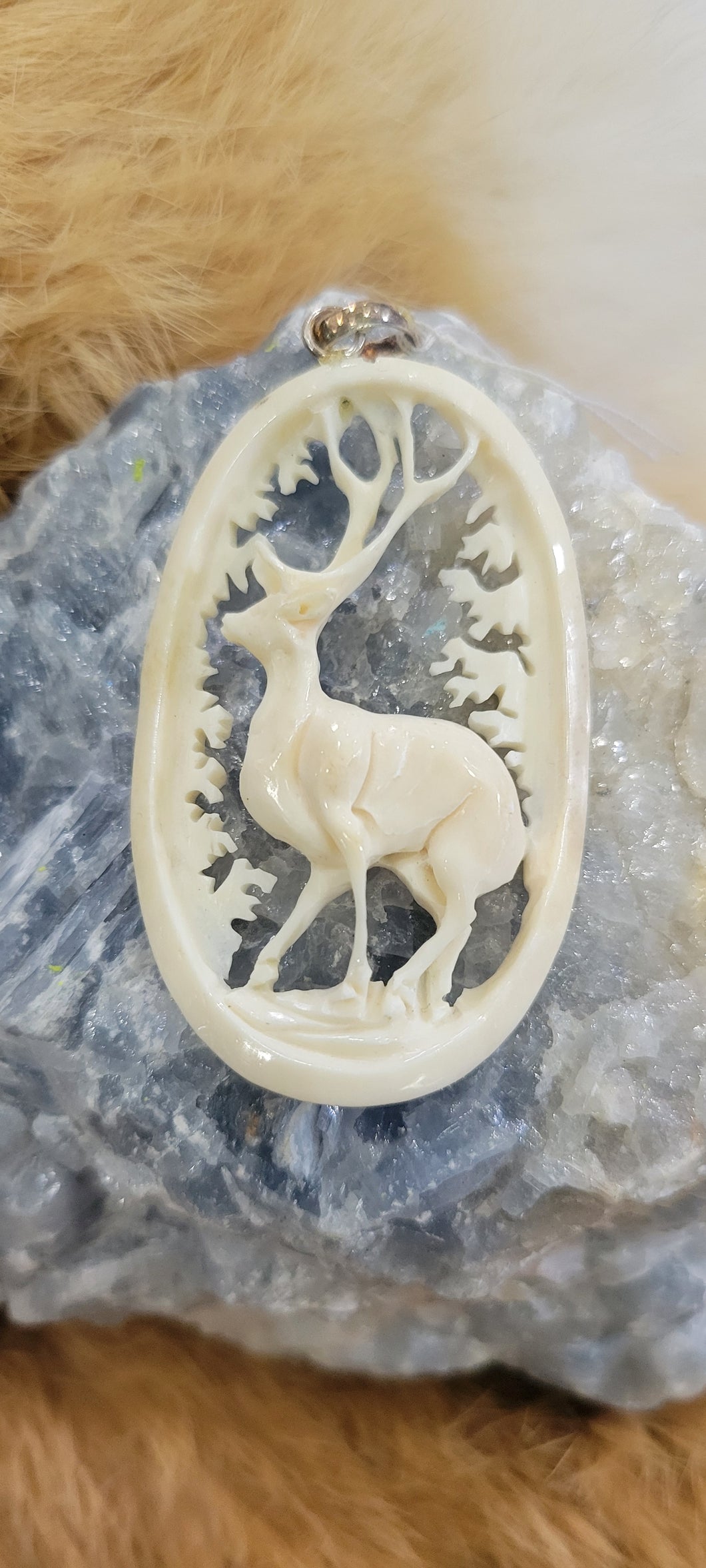 Oval Deer hand carved bone pendant