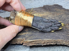 Load image into Gallery viewer, Possum hand necklace on gold tone chain

