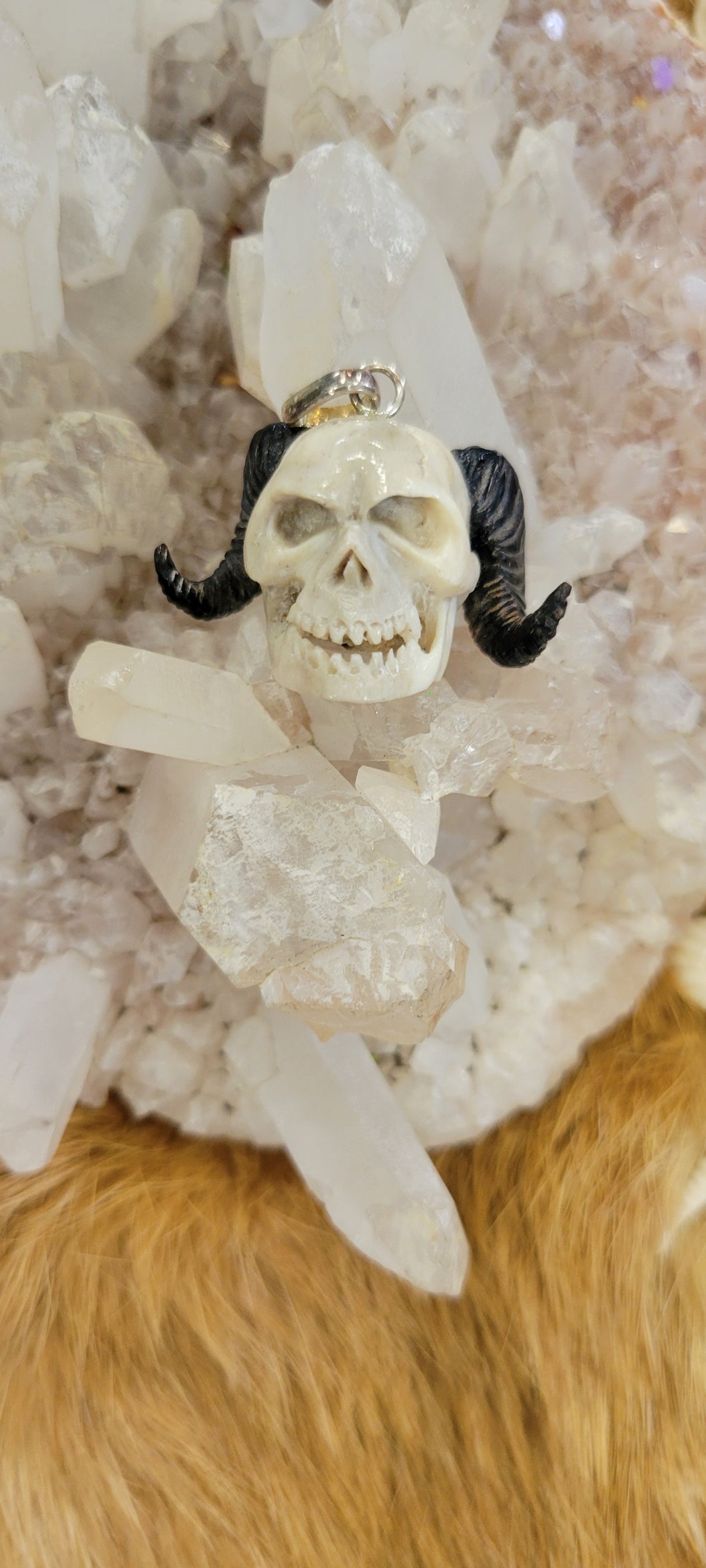 Bone Carved skull with horns pendant